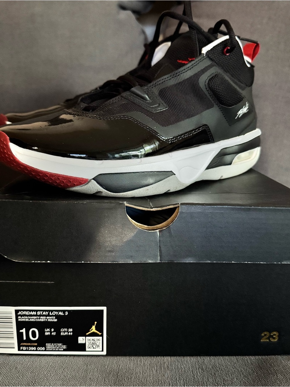 Jordan Stay Loyal 3 Sneakers in Black, Red, White